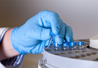 nitrille a man wearing gloves is lifting the centrifuge tube | Allgloves